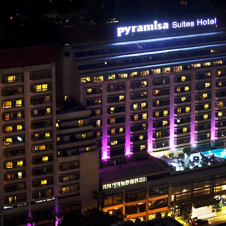 Pyramisa Suites Hotel Cairo Giza Exterior photo The hotel at night