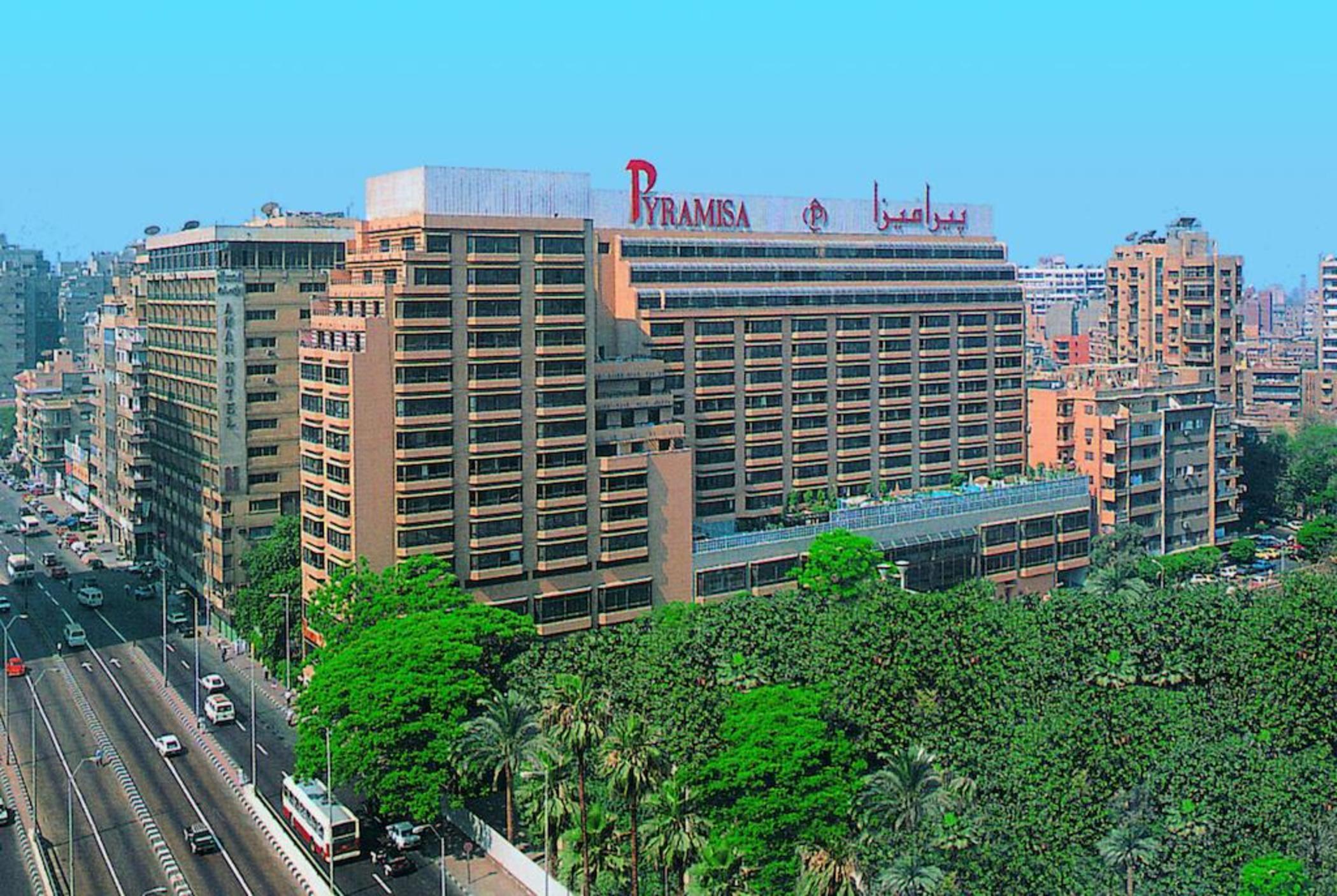 Pyramisa Suites Hotel Cairo Giza Exterior photo The main building of the hotel